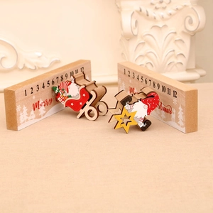 Wooden Christmas countdown calendar featuring a gnome and sled with sliding dates