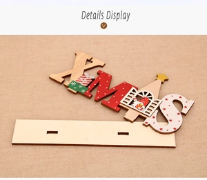 Close-up of wood XMAS letter signs with Santa patterns and slot base detail