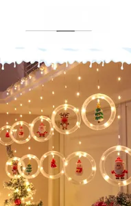 Detail of warm LED Christmas ring lights with hanging Santa, elk, and snowman figures