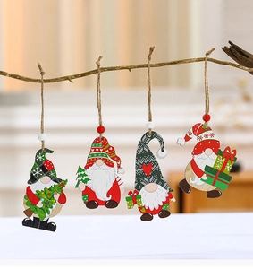 Detail of four wooden Christmas gnome pendants hanging with beads on natural branches