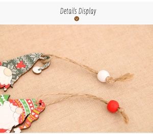 Detail display of wooden Christmas gnome ornaments with red and green painted textures