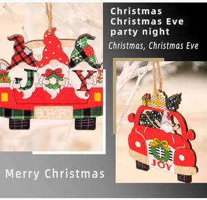 Detail of wooden Christmas car pendants with gnomes and laser-cut Joy Hohoho text