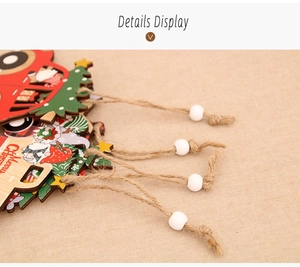 Detail of wooden Christmas car pendant with Merry Christmas text and jute rope decoration