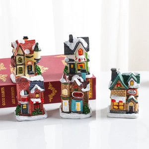 5-piece miniature Christmas village set with resin light-up houses and snowy textures