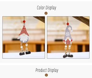 Detail of wooden Christmas gnome ornaments with dangling legs and nordic patterns