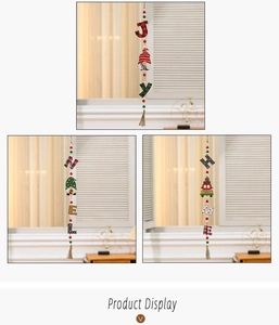 Close-up of wooden Christmas gnome beaded pendants with JOY, NOEL and HOME lettering
