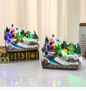 Luminous Christmas village scene with colorful LED lights and moving resin snow house