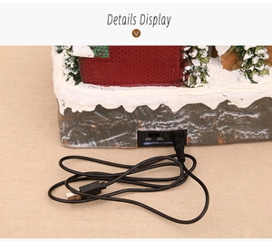 Detail view of the Christmas music box DC power port and included black USB cable