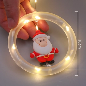 Christmas star LED string light with 10cm Santa Claus ring ornament in warm white glow