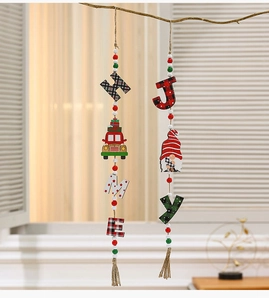 Detail of wooden HOME and JOY Christmas hanging ornaments with beads and tassels