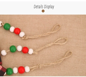 Detailed close-up of knotted hemp rope and colorful painted wooden beads on Christmas ornament