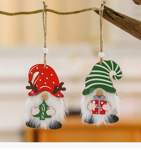 Detailed view of wooden gnome ornaments with plush beards and festive Xmas patterns