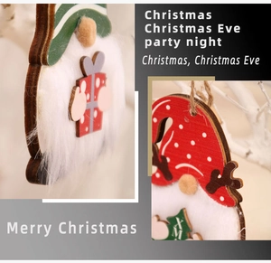Detail of wooden Christmas gnomes with faux fur beards and rustic twine hanging loops
