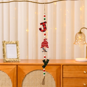 Vertical wooden JOY hanging ornament with gnome, buffalo plaid letters, and tassels