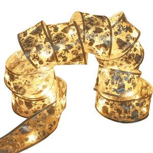 Easter ribbon LED string lights with golden mesh and warm white bunny patterns