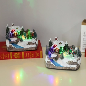 Lighted musical Christmas resin tree scene with moving skaters and colorful LED glow