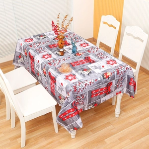 Christmas tablecloth with reindeer and red bow patterns on a grey polyester background