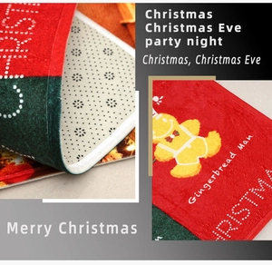 Detail of Christmas gingerbread man mat with non-slip backing and soft fabric texture