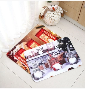 Detail of Christmas doormat showing festive gnome patterns and Merry Christmas print