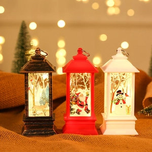 Three LED Christmas lanterns with Santa, elk, and snowman prints on rustic burlap background