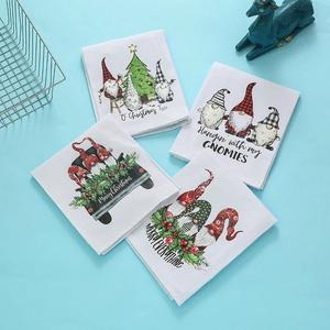 Set of four Christmas hand towels with festive gnomes and trees on light blue background