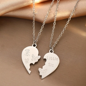 Matching stainless steel heart necklaces for Big Sis and Little Sis with butterfly charms