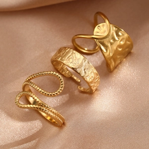 Three-piece gold geometric open rings set with twisted rope and hammered texture design