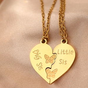 Polished gold stainless steel Big Sis Little Sis heart pendant puzzle necklace set