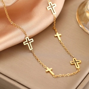 Elegant gold hollow cross pendant necklace for women with minimalist stainless steel chain