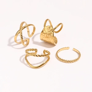 Golden stainless steel geometric ring set with twisted ropes and hammered texture finish