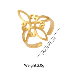 Detail of gold-tone cutout witch knot ring showing diameter size and 2.0g weight details