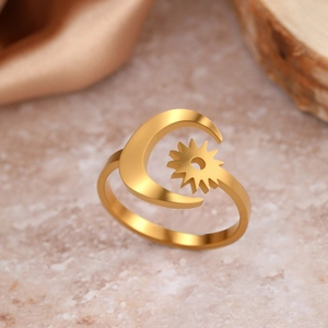 Adjustable gold matte stainless steel open ring featuring sun and moon celestial designs