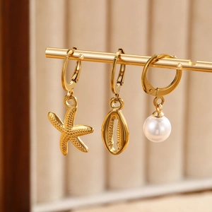 Golden starfish, shell and pearl charms on stainless steel leverback earrings set
