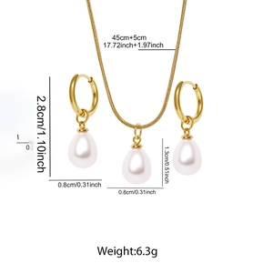 Minimalist stainless steel jewelry set with golden hoop earrings and pearl necklace
