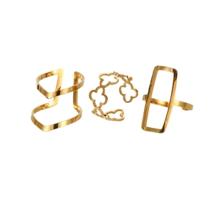 Three-piece gold stainless steel geometric open ring set with clover cutout design