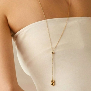Minimalist 18K gold plated stainless steel Y-shaped necklace with polished bead tassels
