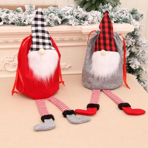 Christmas gnome drawstring gift bags in red and grey with festive striped long legs