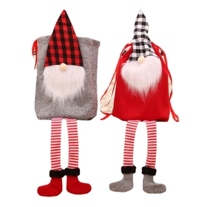 Christmas gnome drawstring gift bags with long striped legs and festive plaid hats