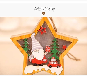 Detailed view of a star-shaped wooden Christmas ornament with 3D Santa and tree scene