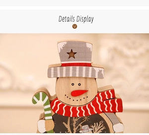 Detail of wooden Christmas snowman ornament with LED lights and painted star cutouts