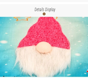 Detail of Christmas gnome pillowcase featuring pink knit hat and long white plush beard