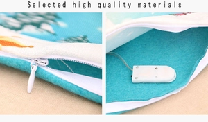 Detail view of the hidden zipper and internal LED battery box for glowing pillow cover