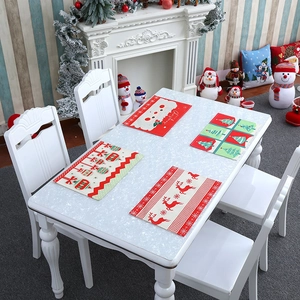 Christmas placemat set of 4 with Santa, elk, and tree patterns for holiday dining table decor