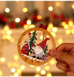 Handheld detailed shot of a wooden gnome Christmas tree pendant with rustic twine