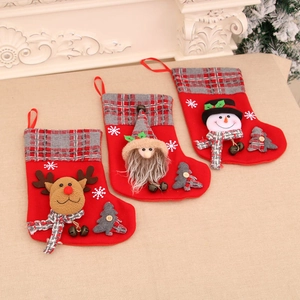 Three-piece Christmas stockings set with 3D reindeer, gnome, and snowman designs