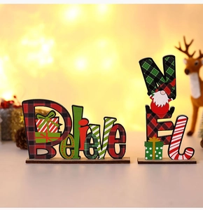 Christmas wooden tabletop decor featuring Believe and Noel lettering with gnome accents
