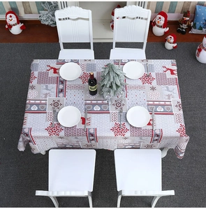 Christmas tablecloth with red reindeer and snowflake pattern for festive dining decor