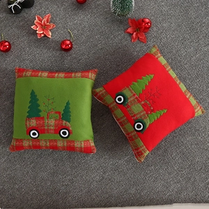 Christmas pillow covers with red truck embroidery and plaid borders for holiday home decor