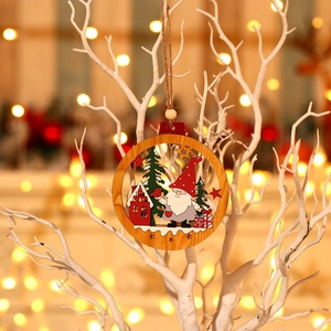Wooden Christmas gnome ornament featuring a laser-cut forest scene with a red gnome and cabin