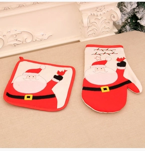 Christmas oven mitt and pot holder set featuring Santa Claus and red bird pattern